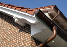 09_einfamilienhaus-neubau-detail-landhaus-dachueberstaende-pfettenkoepfe