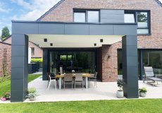 22_einfamilienhaus-neubau-detail-ueberdachnung-terrasse-fassadenplatten