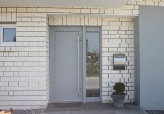 54_einfamilienhaus-neubau-detail-doppelhaus-eingang-klibnker-putz-fassade